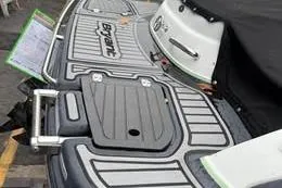 Slide: The Image of 2015 Bryant 198 Walkabout boat deck with sleek design and branding. - 8