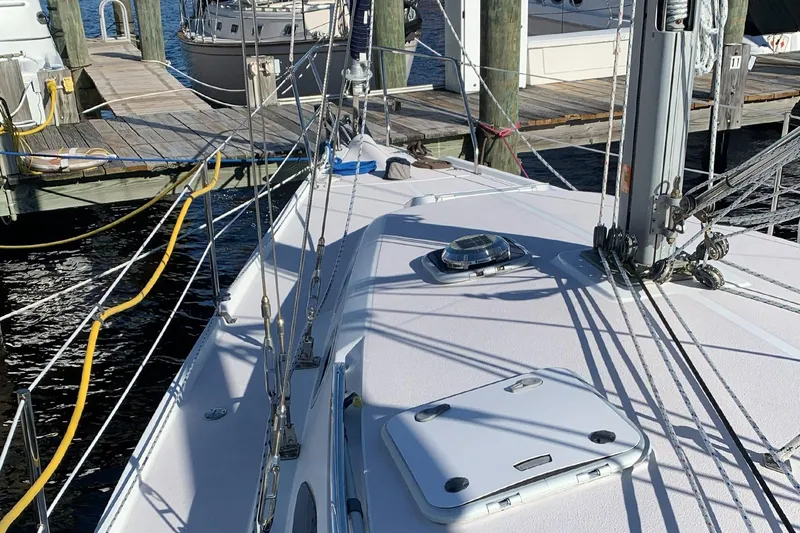 The Image of 2003 Catalina 350 sailboat docked, showing deck and rigging details. - 0