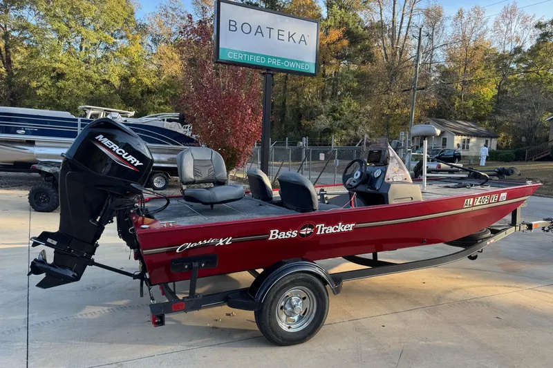 Slide: The Image of 2020 Bass Tracker Classic boat with Mercury engine at Boateka dealership. - 2