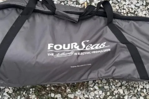 Slide: The Image of Carrying bag for Four Seas electric propulsion system on gravel, related to Beneteau First 24 SE 2022. - 18