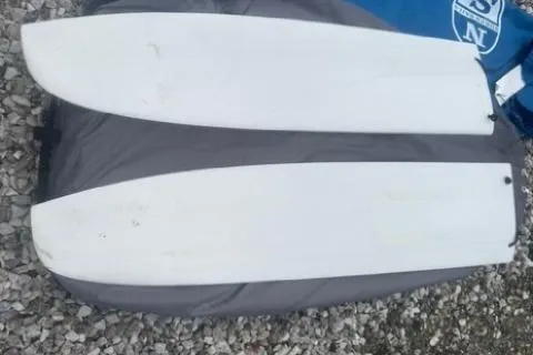 Slide: The Image of Rudders - 2022 Beneteau First 24 SE sailboat on gravel. - 24