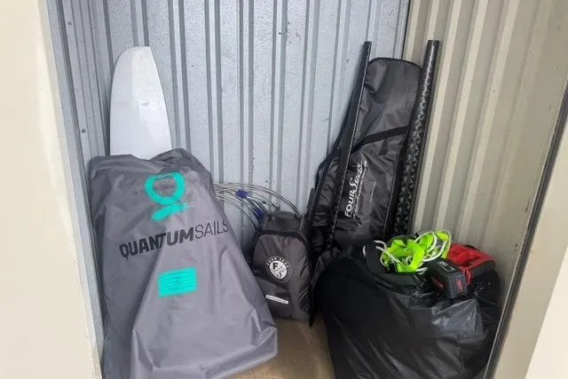 Slide: The Image of Boat contents in a storage unit. 2022 Beneteau First 24 SE sailboat. - 31