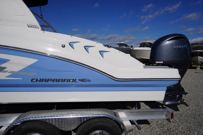 Slide: The Image of 2026 Chaparral 23 SSi OB boat with Yamaha outboard motor on trailer. - 69