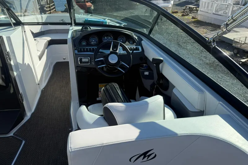 Slide: The Image of Interior view of 2016 Monterey 258SS Super Sport boat cockpit with steering wheel and seating. - 7