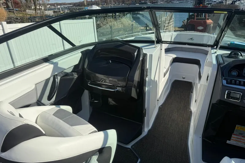 Slide: The Image of 2016 Monterey 258SS Super Sport boat interior with seating and dashboard view. - 8