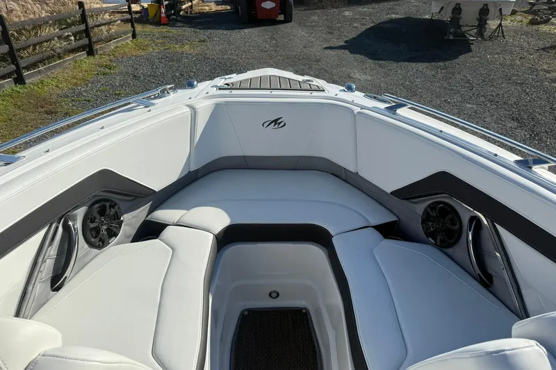 Slide: The Image of 2016 Monterey 258SS Super Sport boat interior with white seating and speakers. - 9