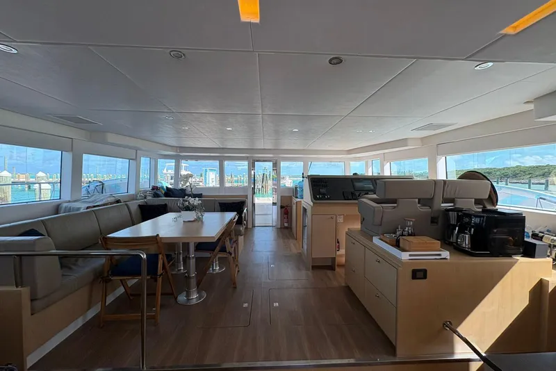 Slide: The Image of Interior of 2020 Silent 55 yacht with modern seating and navigation area. - 13
