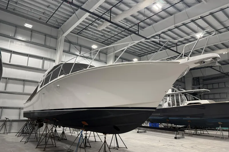 Slide: The Image of 2020 Hatteras GT45X yacht in indoor storage facility. - 15