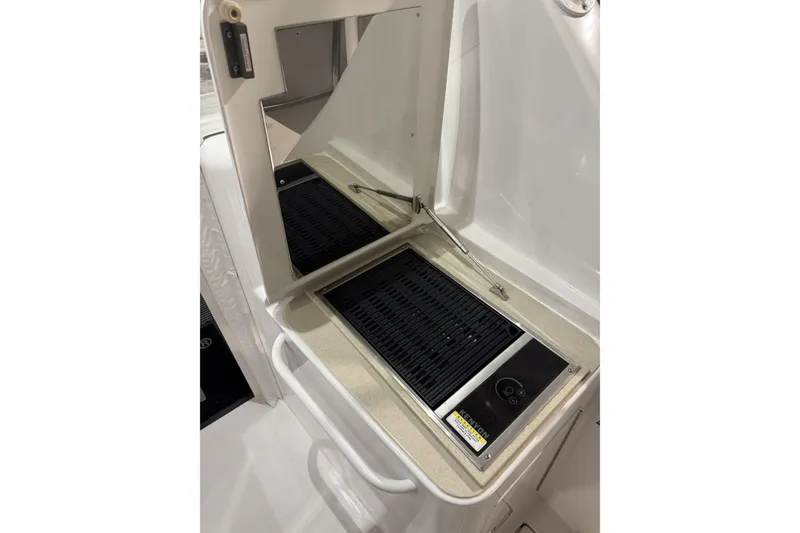 Slide: The Image of Outdoor grill on 2020 Hatteras GT45X yacht, featuring sleek design and modern amenities. - 22