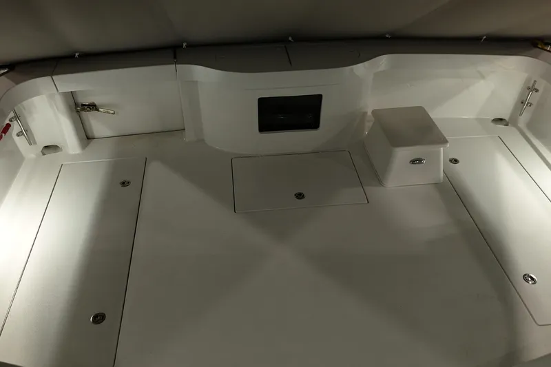 Slide: The Image of 2020 Hatteras GT45X boat interior with storage compartments and sleek design. - 25