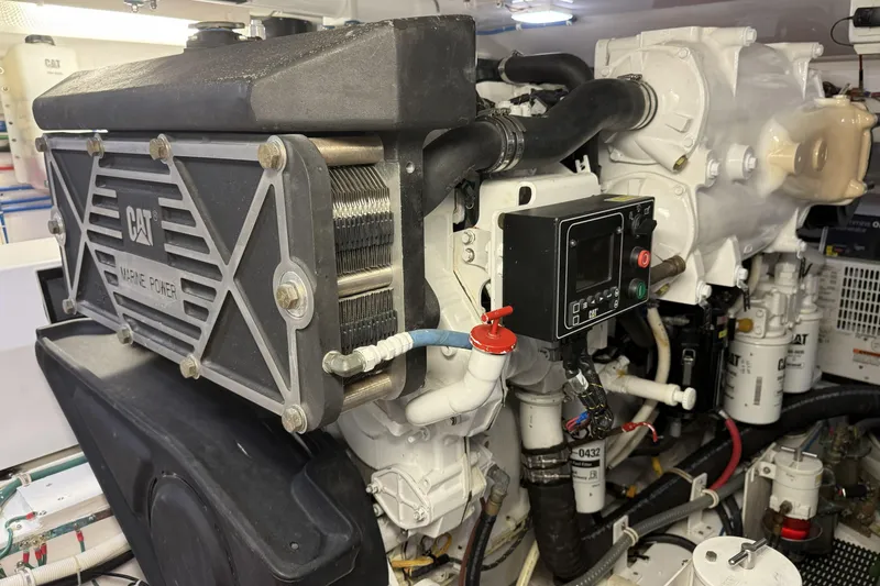 Slide: The Image of Engine room of 2020 Hatteras GT45X with CAT marine power system. - 66