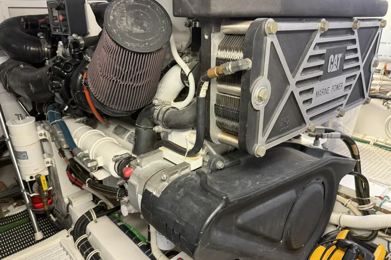 Slide: The Image of Engine room of 2020 Hatteras GT45X yacht featuring CAT marine power components. - 71