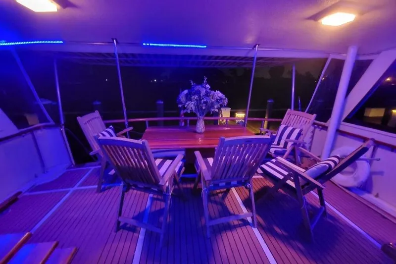 Slide: The Image of Decorative marine-themed interior with lamp and sculptures on Hatteras 61 Cockpit MY, 1984. - 15