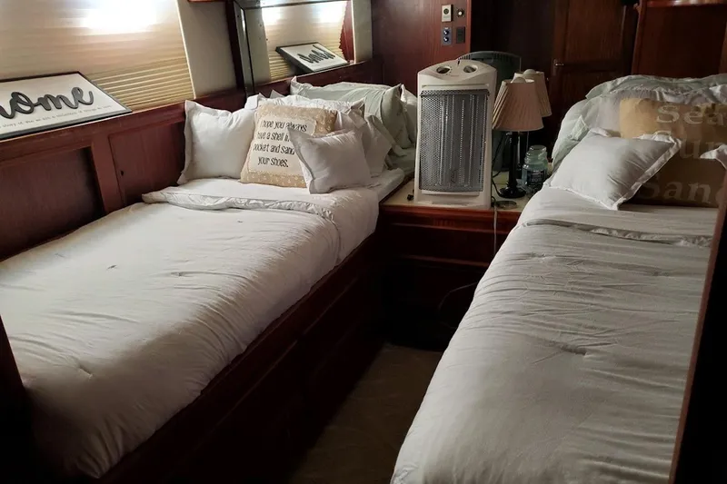 Slide: The Image of View from the helm of a 1984 Hatteras 61 Cockpit MY yacht on open water. - 19