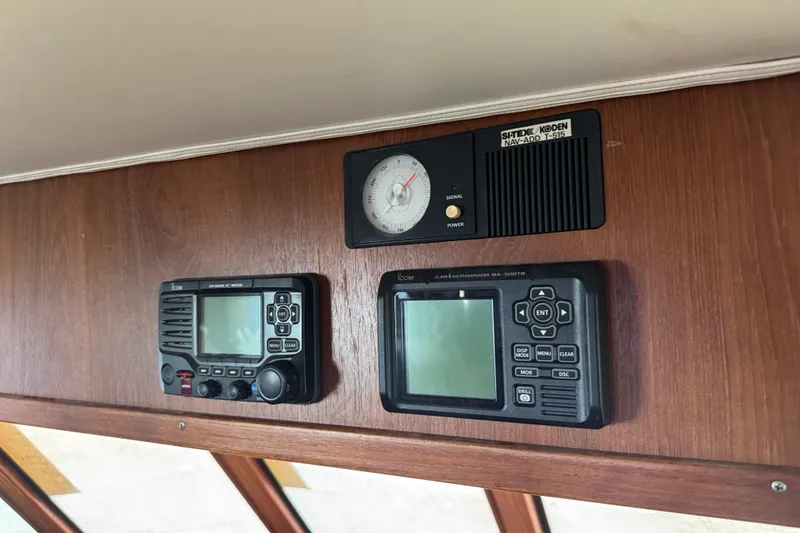 Slide: The Image of Control panel of a 1984 Hatteras 61 Cockpit MY yacht with navigation instruments. - 49