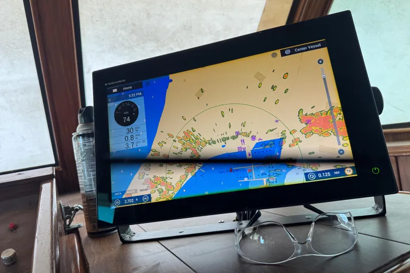 Slide: The Image of Navigation screen on 1984 Hatteras 61 Cockpit MY yacht, displaying nautical chart. - 48