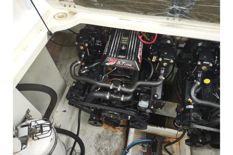 Slide: The Image of Engine compartment of 2004 Maxum 3100 SE boat with Mercury 5.7L engine. - 23