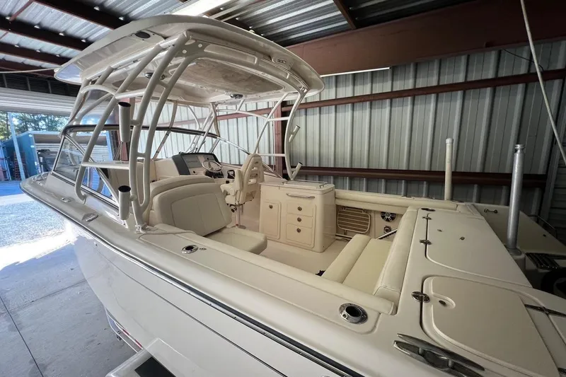 Slide: The Image of 2023 Grady-White Freedom 275 boat interior in a covered storage area. - 28