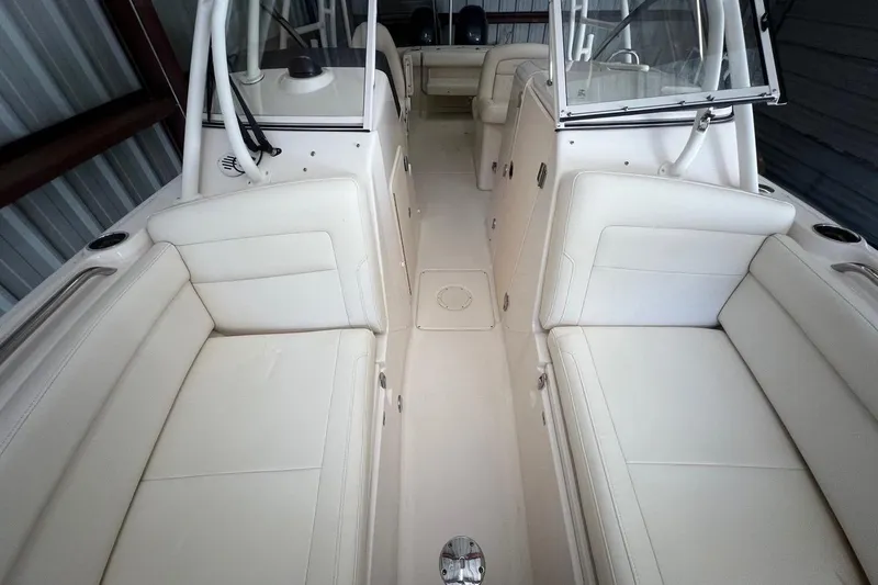 Slide: The Image of 2023 Grady-White Freedom 275 boat interior with spacious seating and modern design. - 30
