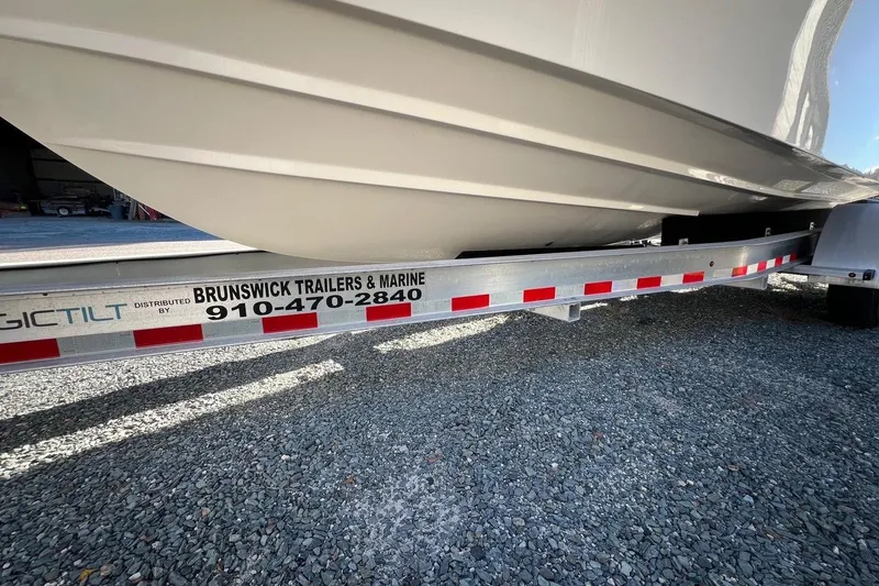 Slide: The Image of 2023 Grady-White Freedom 275 boat on Brunswick Trailers & Marine trailer. - 32