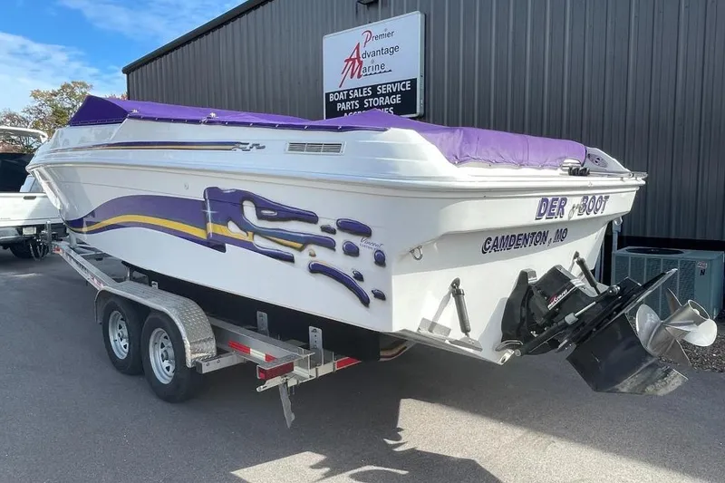 Slide: The Image of 2000 Baha MACH 1 speedboat with purple accents on a trailer, Camdenton, MO. - 3