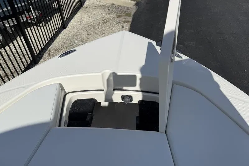 Slide: The Image of 2026 Pathfinder 2200 TRS boat deck, white upholstery, outdoor setting. - 10