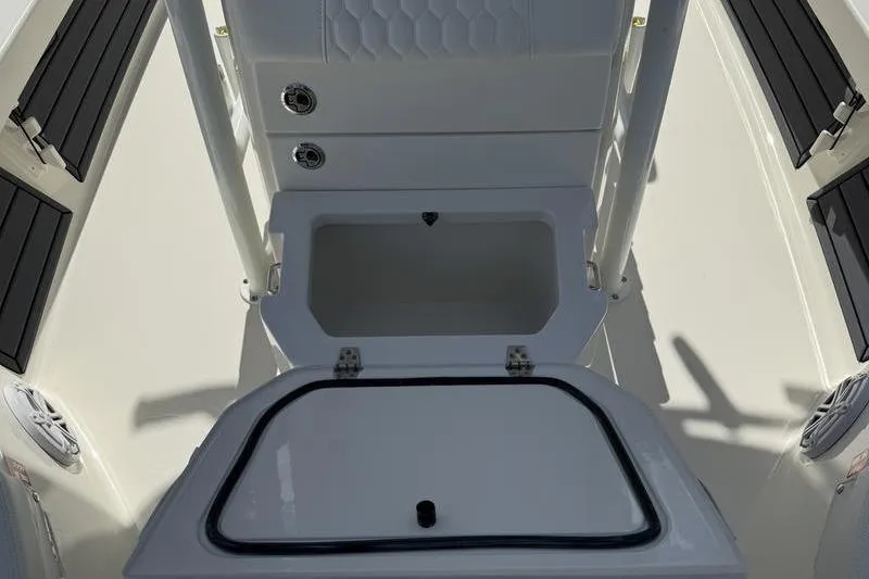Slide: The Image of 2026 Pathfinder 2200 TRS boat interior with open storage compartment. - 12