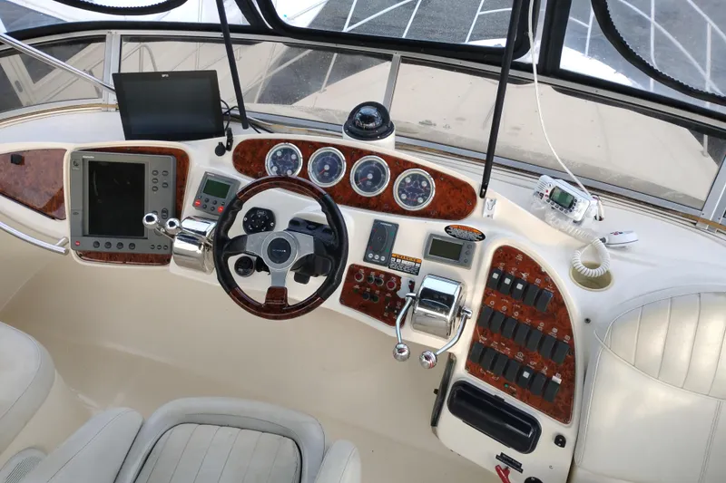 Slide: The Image of Cockpit of 2004 Meridian 459 Motoryacht with navigation instruments and controls. - 15