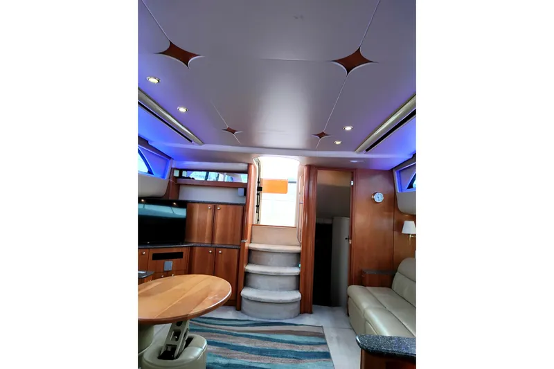 Slide: The Image of Interior of 2004 Meridian 459 Motoryacht with modern furnishings and elegant lighting. - 31