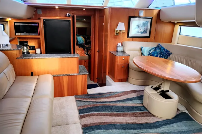Slide: The Image of Luxurious interior of 2004 Meridian 459 Motoryacht with plush seating and elegant wood finishes. - 45