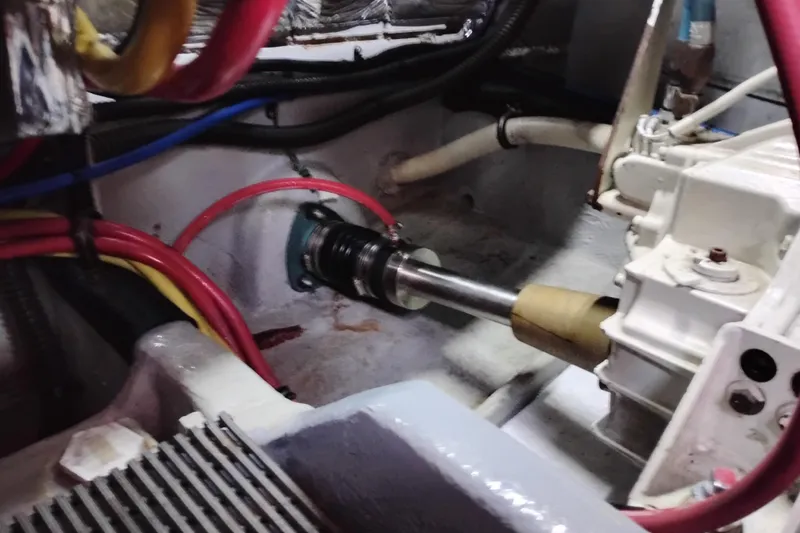 Slide: The Image of Engine room of 2004 Meridian 459 Motoryacht with visible wiring and mechanical components. - 68