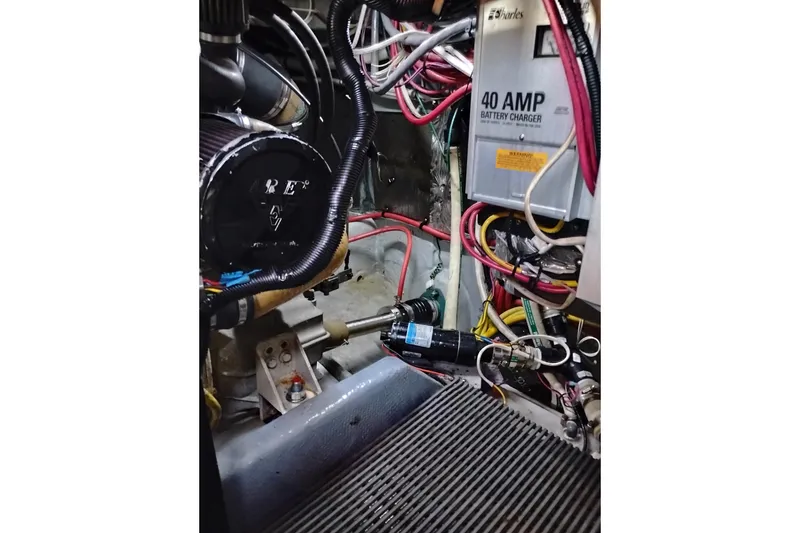 Slide: The Image of Engine room of 2004 Meridian 459 Motoryacht with battery charger and wiring. - 75