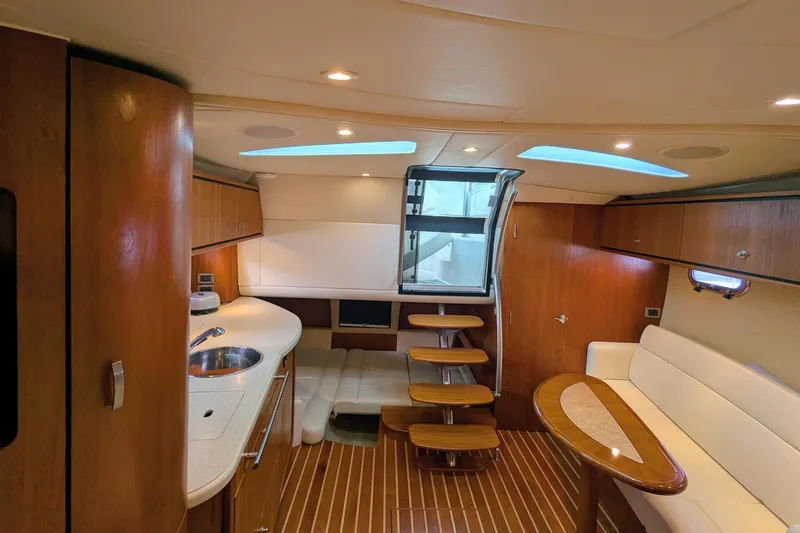 Slide: The Image of Luxurious interior of 2008 Tiara Yachts 3600 Sovran with wood finishes and modern amenities. - 21