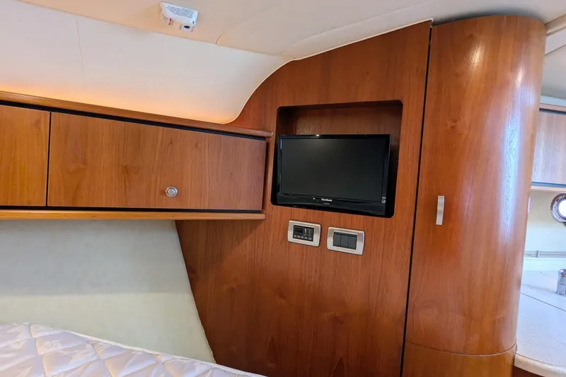 Slide: The Image of Interior of 2008 Tiara Yachts 3600 Sovran with wood paneling and built-in TV. - 39