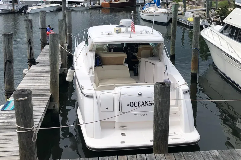 Slide: The Image of 2008 Tiara Yachts 3600 Sovran docked at marina, rear view. - 4