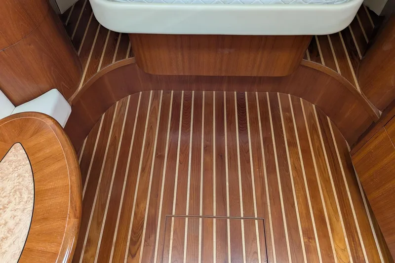 Slide: The Image of Luxurious wood interior of 2008 Tiara Yachts 3600 Sovran, featuring elegant striped flooring. - 45