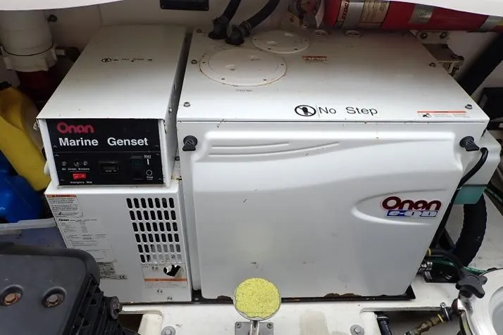Slide: The Image of Onan marine generator in a 2008 Tiara Yachts 3600 Sovran engine room. - 48