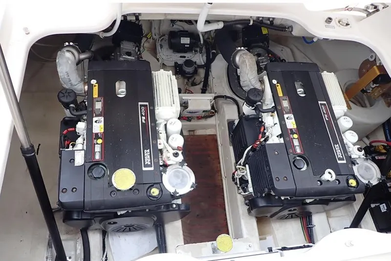 Slide: The Image of Engine compartment of a 2008 Tiara Yachts 3600 Sovran, featuring dual inboard motors. - 49