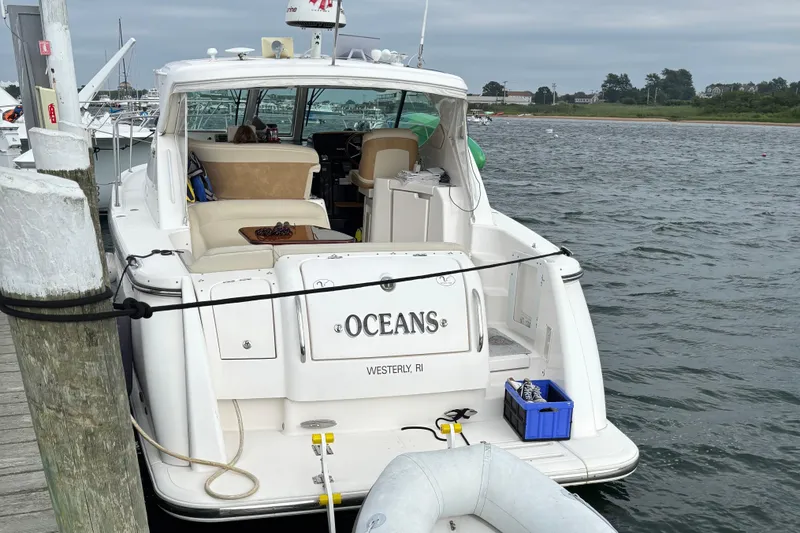 Slide: The Image of 2008 Tiara Yachts 3600 Sovran docked, rear view with open cockpit and accessories. - 5