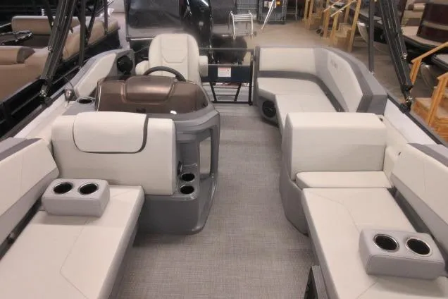 Slide: The Image of 2026 Sylvan A-16 boat interior with spacious seating and modern design. - 5
