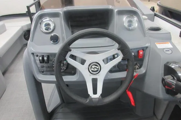 Slide: The Image of Steering console of 2026 Sylvan A-16 boat with modern controls and dashboard. - 7