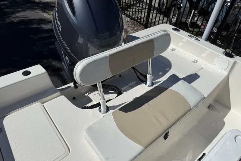 Slide: The Image of 2026 Bulls Bay 2000 boat with Yamaha engine, featuring beige and white seating. - 11