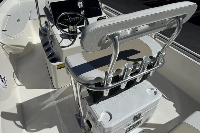 Slide: The Image of 2026 Bulls Bay 2000 boat interior with steering console and seating. - 13