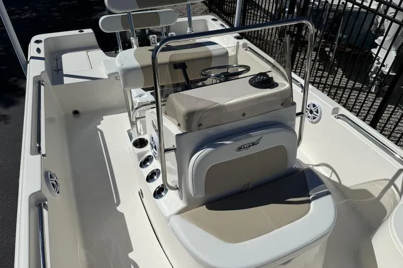 Slide: The Image of 2026 Bulls Bay 2000 boat interior with steering console and seating. - 7