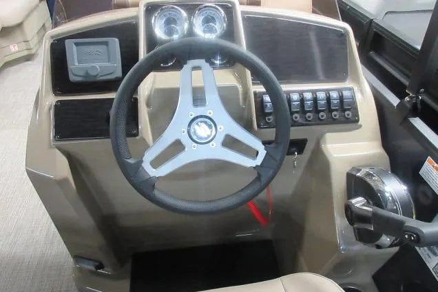 Slide: The Image of Steering console of 2026 Sylvan 818 Mirage Cruise boat with gauges and controls. - 4