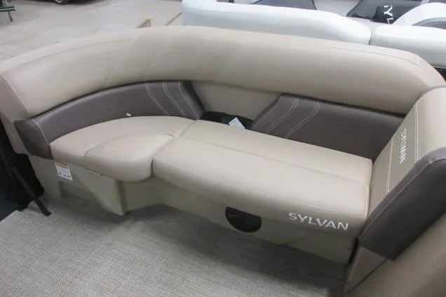 Slide: The Image of Luxurious seating on 2026 Sylvan 818 Mirage Cruise boat, featuring elegant beige upholstery. - 6