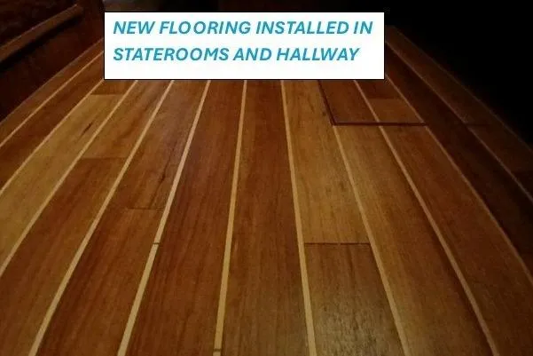 Slide: The Image of New wooden flooring in 1977 Hatteras 48 Long Range Cruiser staterooms and hallway. - 65