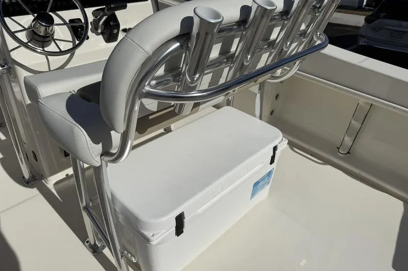 Slide: The Image of 2025 Bulls Bay 230 Center Console boat interior with seating and storage. - 14