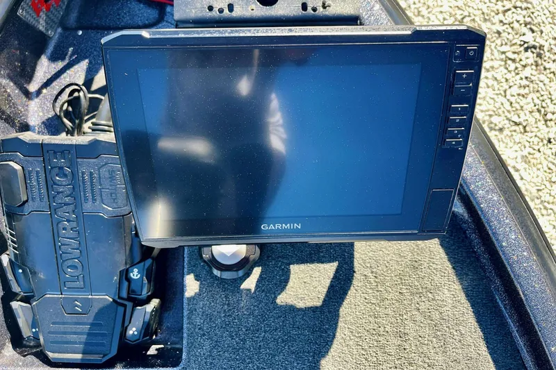 Slide: The Image of 2014 Bass Cat Eyra boat with Garmin and Lowrance electronics on deck. - 7