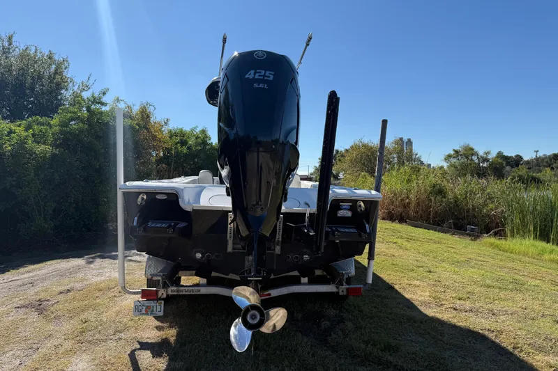 Slide: The Image of 2021 Tidewater 2700 Carolina Bay boat on trailer, rear view with Yamaha 425 engine. - 3